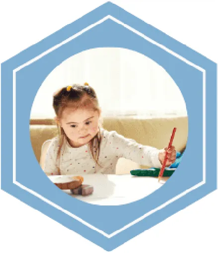 Young girl drawing with coloured pencils